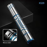 A tactical flashlight made of titanium alloy with blue accents, showing a micro USB charging port.